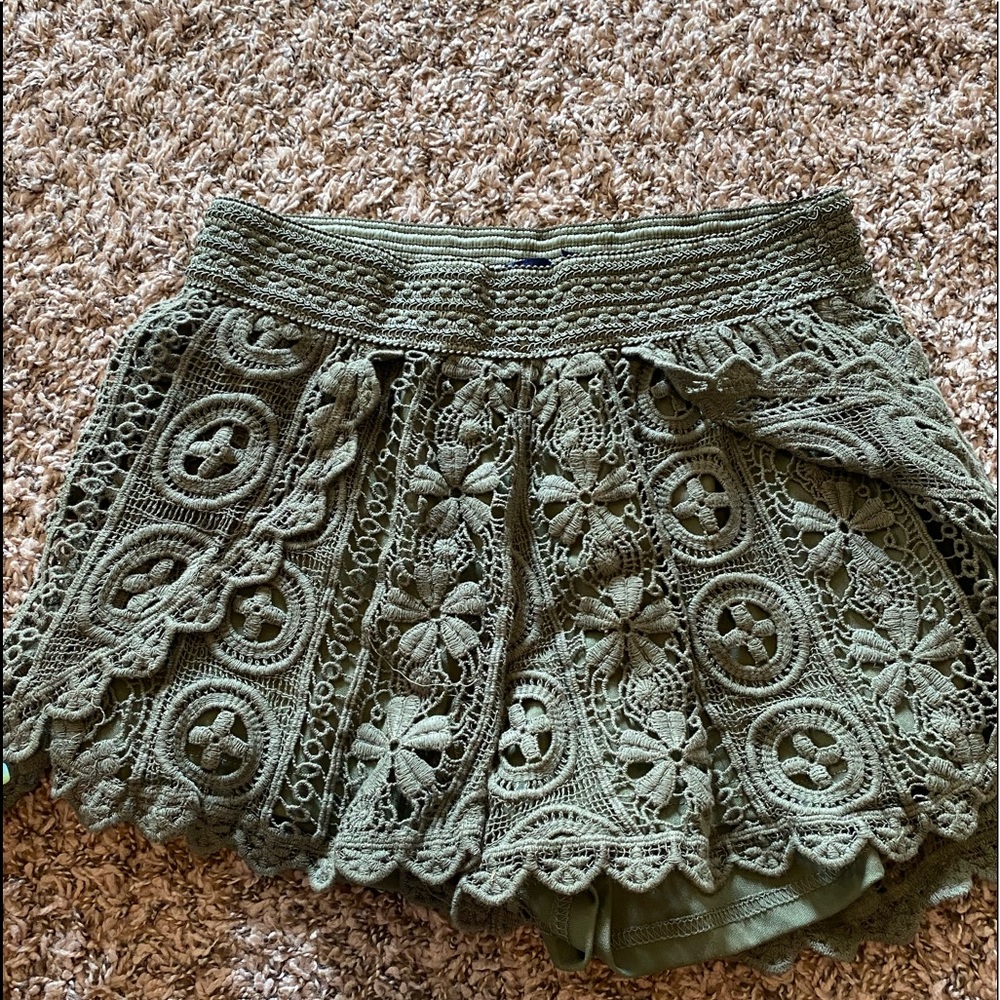 green patterned shorts